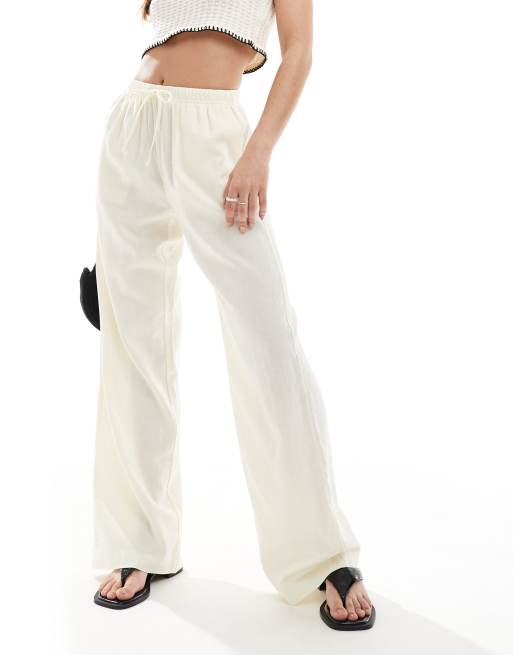 Bershka - Pantalon large en lin mélangé noué à la taille - Jaune