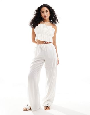 Bershka - Pantalon large en lin noué à la taille - Blanc | ASOS