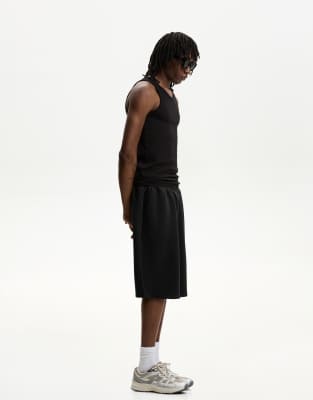 ASOS DESIGN - Pantaloncini da bagno lunghezza media neri con stampa a
