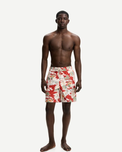 Bershka - Pantaloncini da bagno rossi con stampa tropicale taglio lungo  