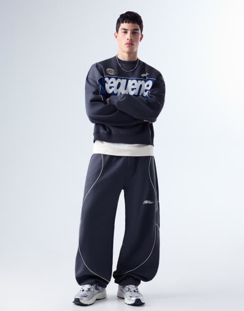 Bershka - Pantaloni a palloncino in felpa blu denim con stampa - view 1