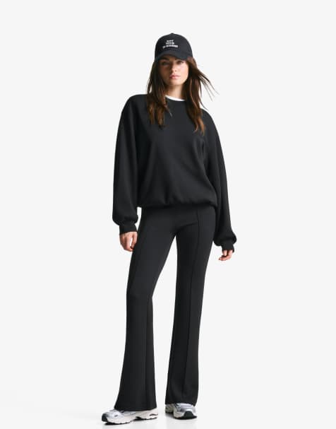 Bershka - Pantaloni a zampa neri in tessuto modal - view 1