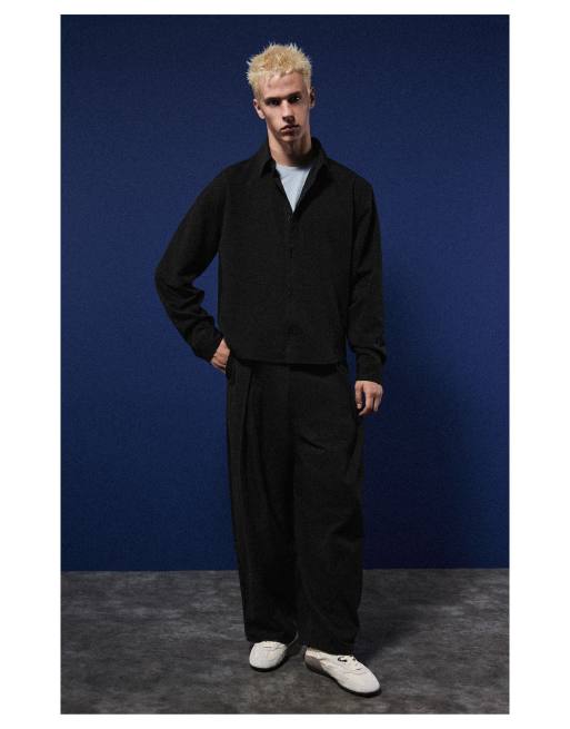 Bershka pantaloni baggy neri con piega incrociata, 6 di 7
