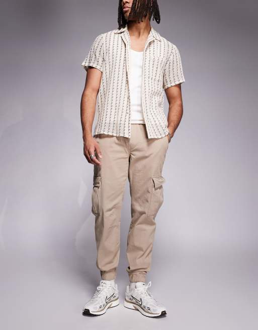 Bershka - Pantaloni cargo color pietra con fondo elasticizzato