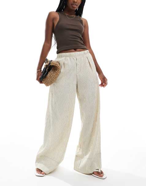 Bershka - Pantaloni con fondo ampio in seersucker color sabbia a righe - view 1