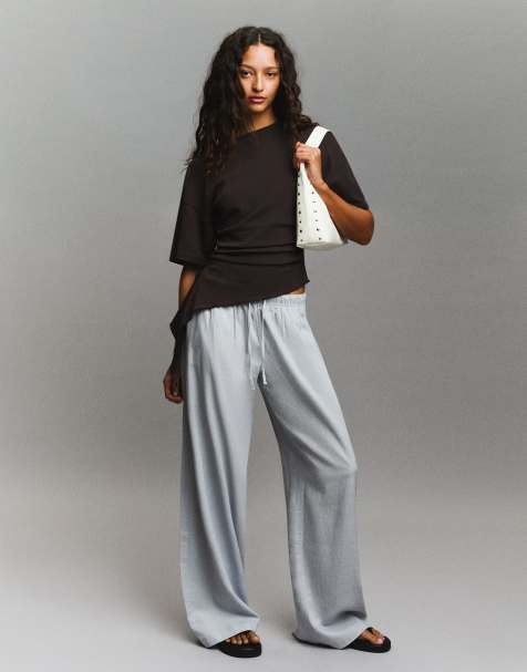 Bershka - Pantaloni in misto lino grigi con elastico in vita - view 1