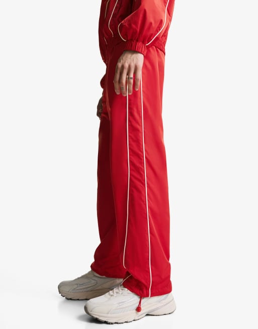 Bershka Pantaloni sportivi ampi tecnici rossi ASOS