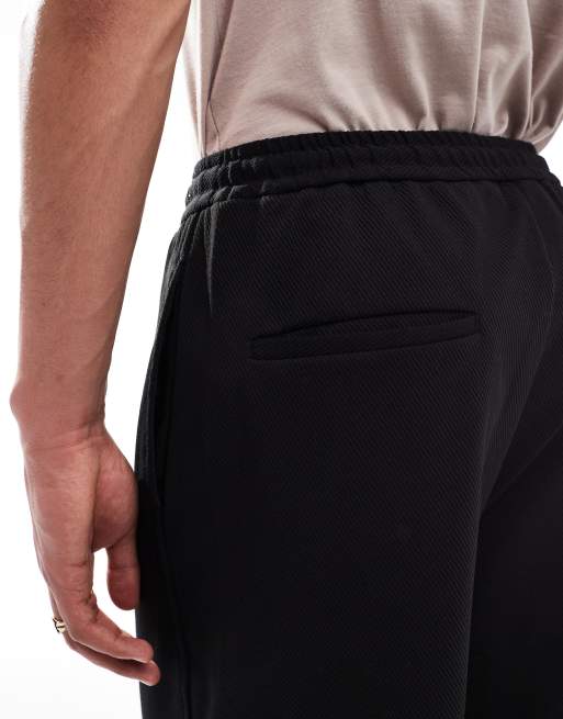 Bershka Pantaloni sportivi neri con pannello laterale ASOS