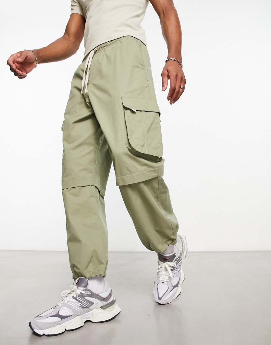 Bershka parachute pocket cargo trouser in khaki-Green