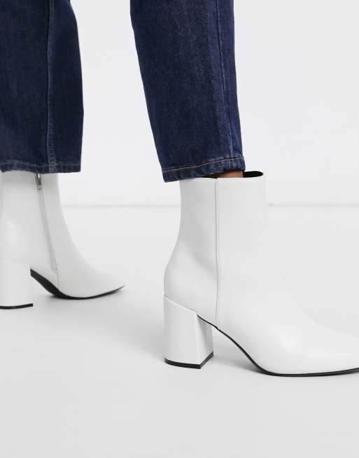 Bershka patent boot with block heel in white ASOS