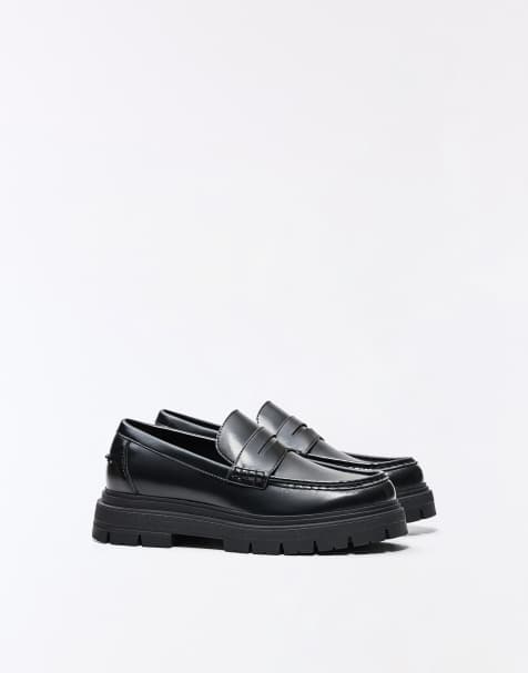 Bershka Penny loafers in black - view 1