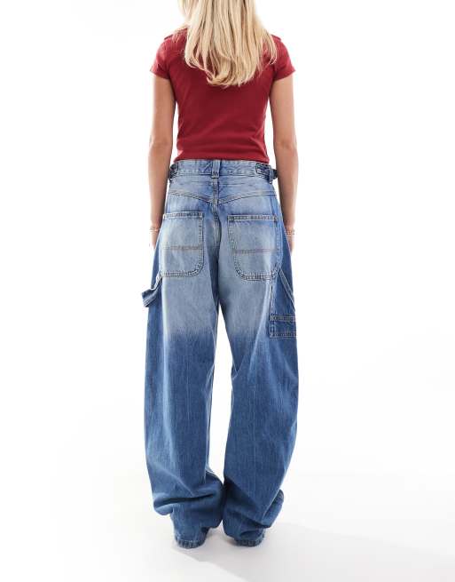 Bershka Petite adjustable waist carpenter jeans in light wash blue