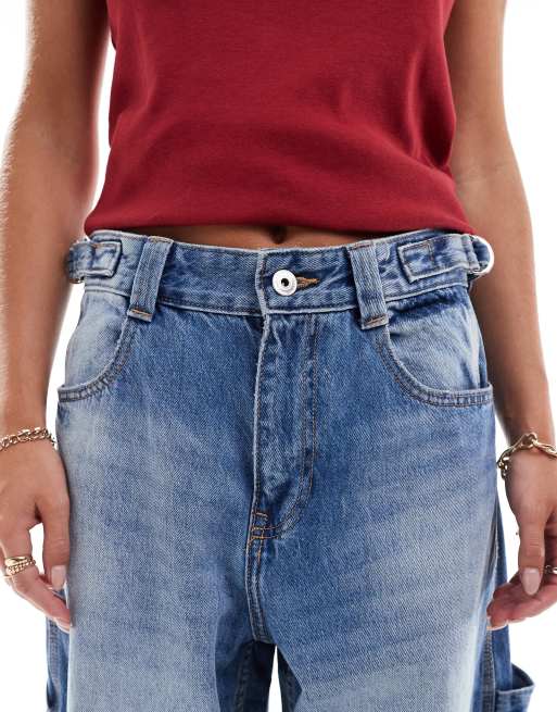 Bershka Petite adjustable waist carpenter jeans in light wash blue