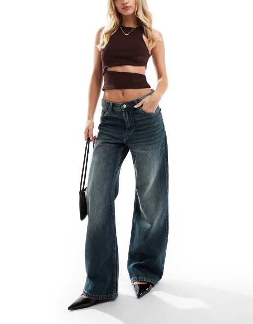 Bershka - Petite - Baggy jeans met wijde pijpen in mid-wash blauw