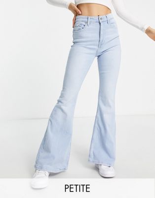 Bershka Petite clean flare jeans in light blue - ASOS Price Checker