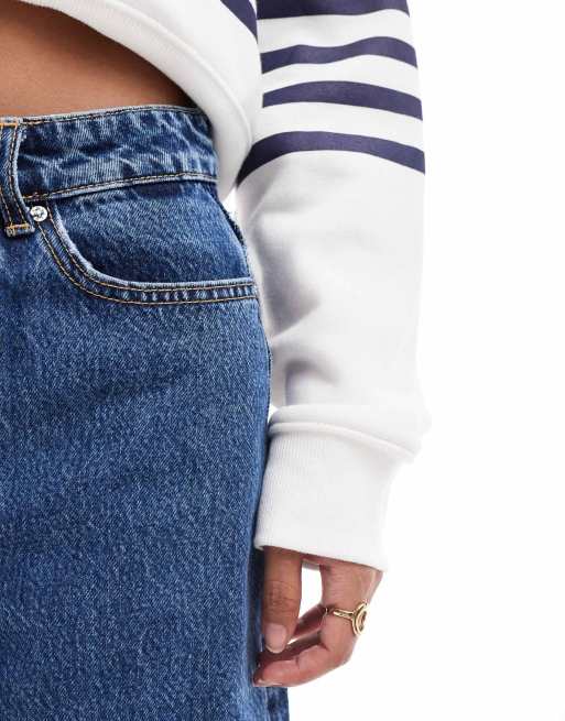 Bershka Petite comfort fit mom jeans in mid blue