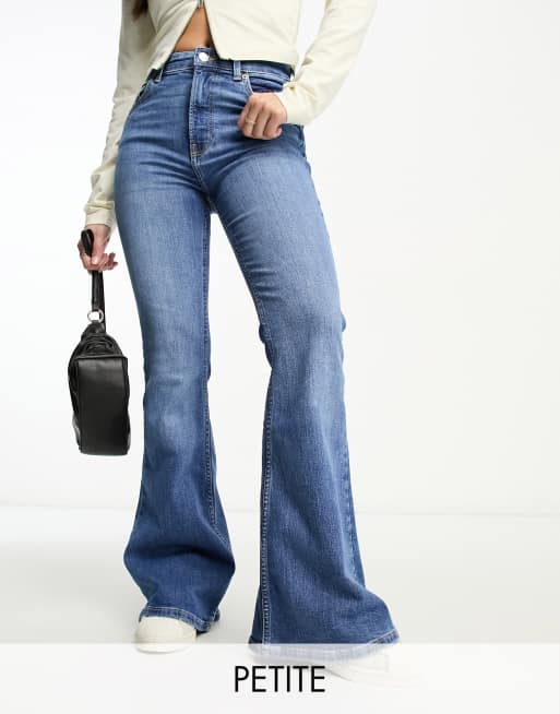 Bershka Petite flared jeans in mid blue