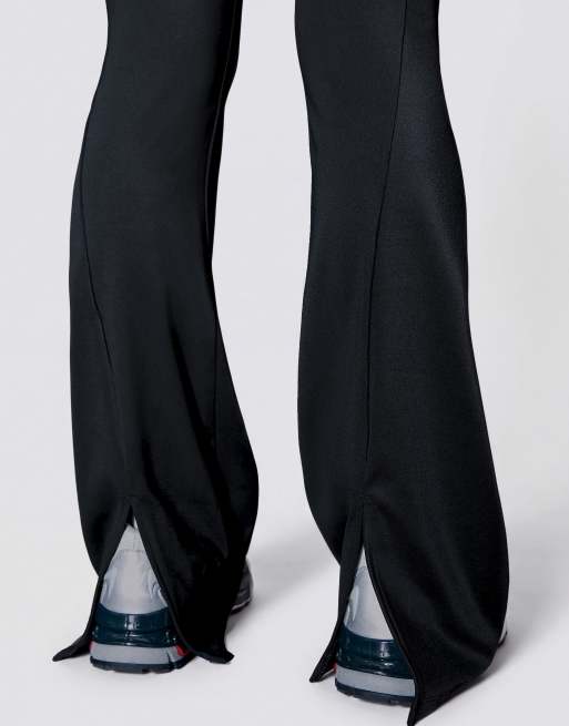 Bershka Petite flared technical fabric trousers in black, 5 of 6