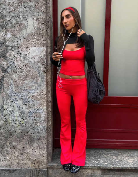 Bershka Petite flared technical fabric trousers in red - view 1