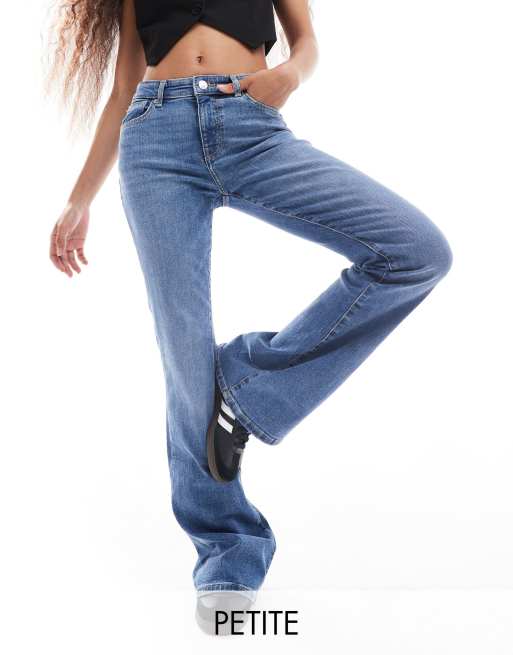 Bershka Petite high rise flared jeans in light wash blue