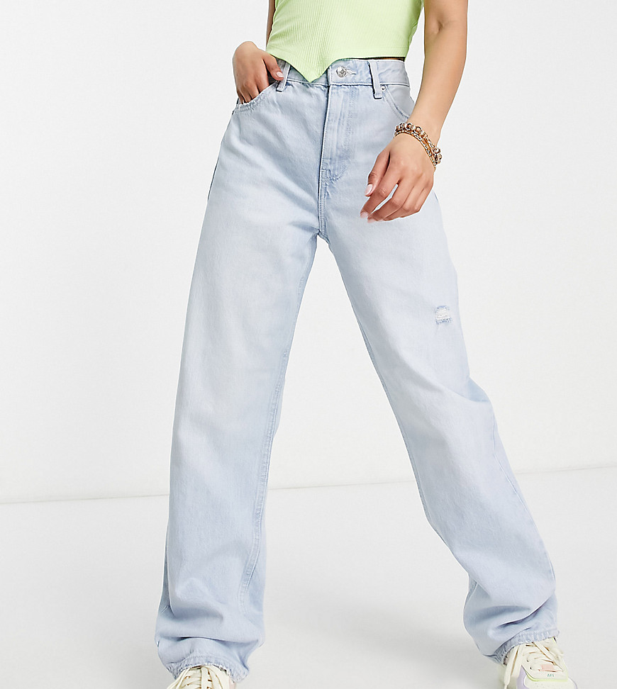 Bershka Petite high waisted dad jeans in bleached wash-Blue