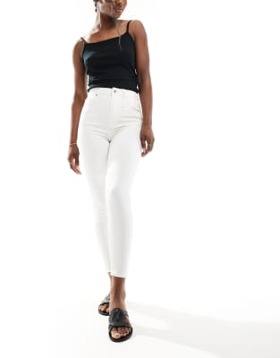 Petite high waisted skinny jeans in white