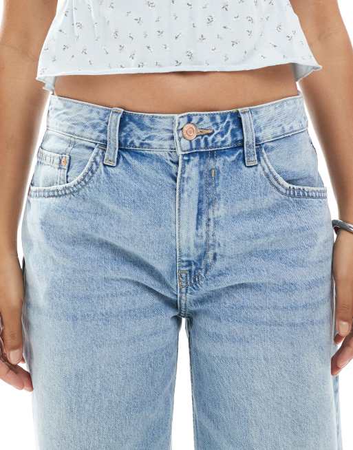 Bershka Petite high waisted wide leg jeans in light wash blue