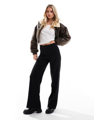 Bershka Bershka Petite high waisted wide leg tailored trousers in black