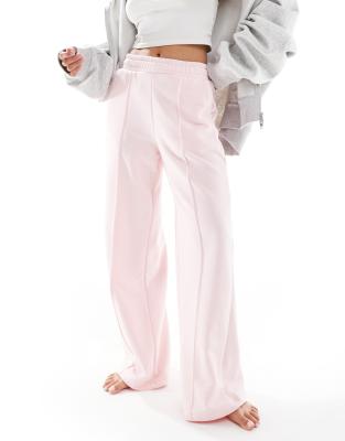 Bershka Petite - Jogginghose in Rosa mit weitem Bein