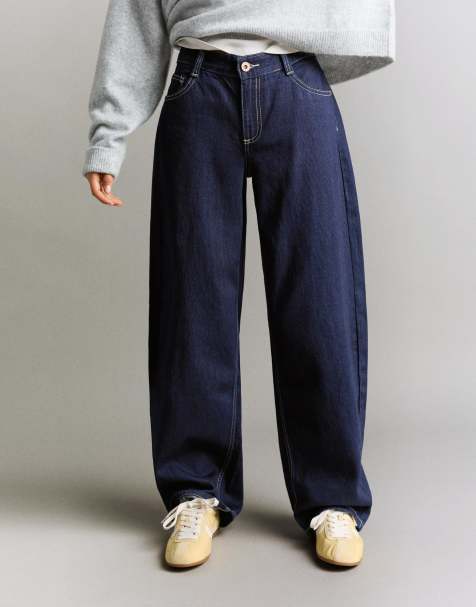 Bershka Petite low-rise baggy barrel jeans in blue