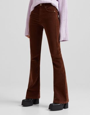 Bershka Petite slim leg cord trouser in brown