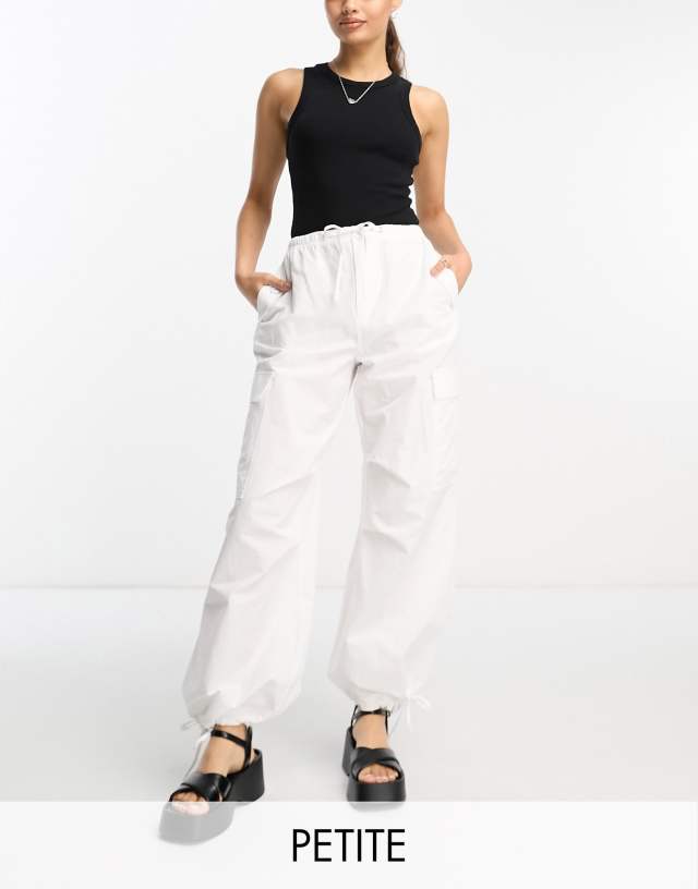 Bershka Petite tie waist nylon cargo parachute pants in white