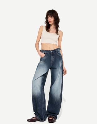 Bershka Petite - Verstellbare Carpenter-Jeans in Marineblau mit Ballon-Schnitt