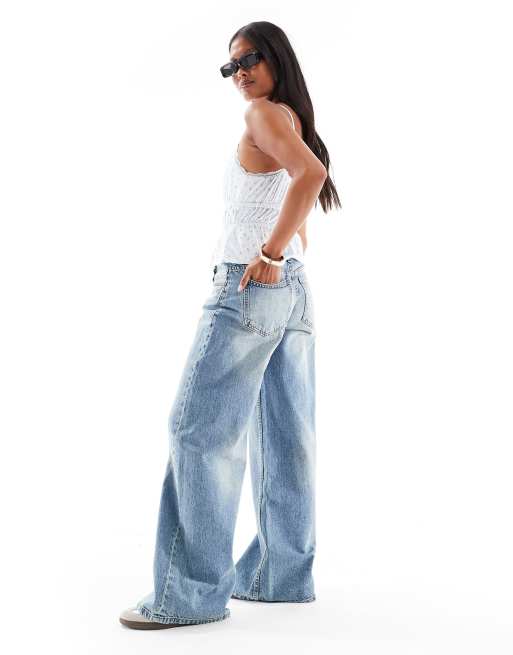 Bershka Petite wide leg jeans in mid wash blue