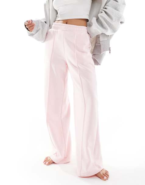 Bershka Petite wide leg joggers in pink - view 1
