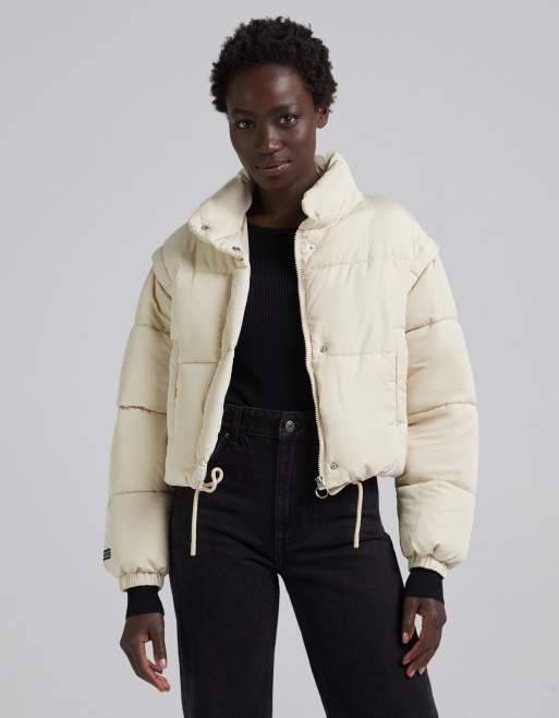 Piumino beige deals corto