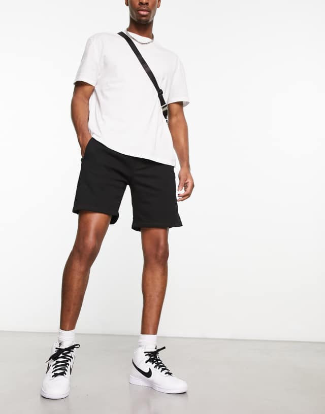 Bershka plain jersey shorts in black