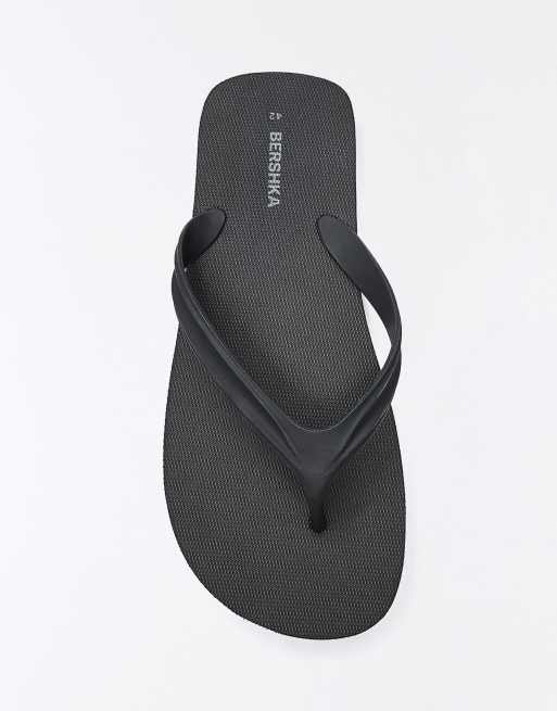 Bershka - Platte teenslippers in zwart, 2 van 4