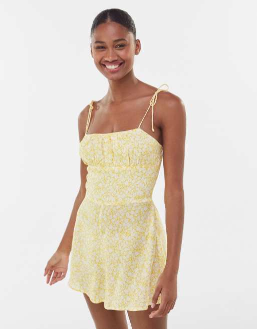 Bershka - Playsuit met dunne bandjes en print in geel