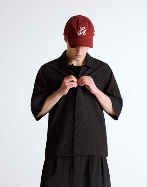 Bershka – Plissiertes, kurzärmliges, kastiges Hemd in Schwarz - view 1