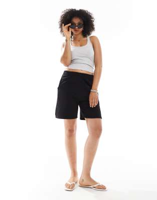 Bershka plush bermuda shorts with embroidery in black - view 1
