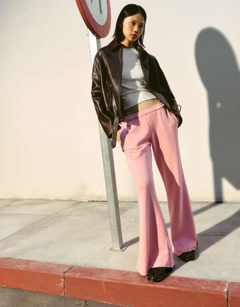 Bershka Plush flare trousers with frayed hems in pink - view 1