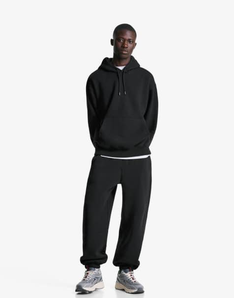 Bershka Plush joggers in black - view 1