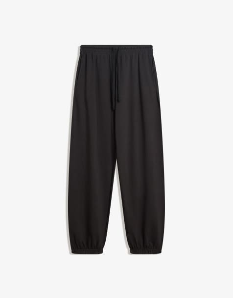 Bershka Plush joggers in black - view 1