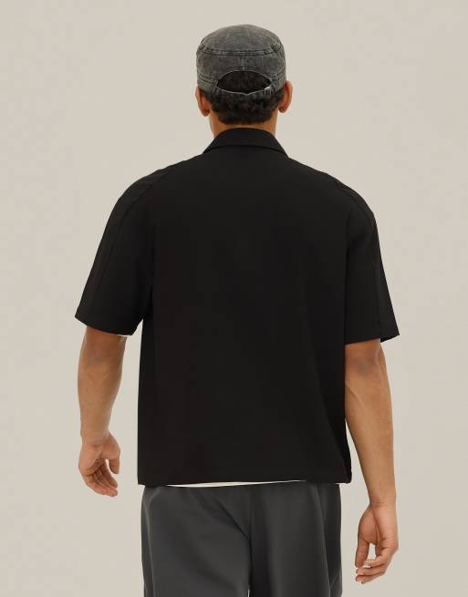 Bershka - Polo nera a maniche corte con ricami, 4 di 4