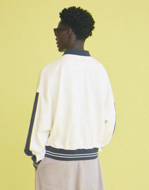 Bershka poloshirt met lange mouwen en print in crème en navy, 4 van 6