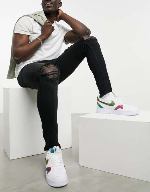 Bershka premium super skinny fit jeans with rips in black
