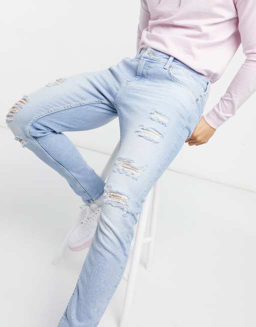 Bershka premium super skinny fit jeans with rips in blue ASOS