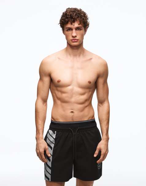 Bershka Printed boxy double waistband swimming trunks in black - view 1