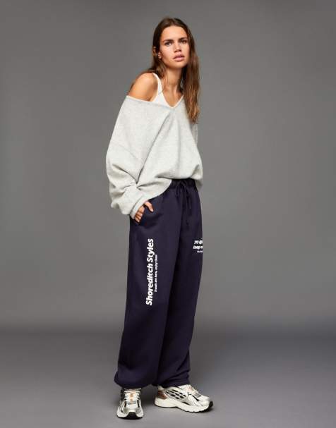 Bershka Printed plush joggers in navy